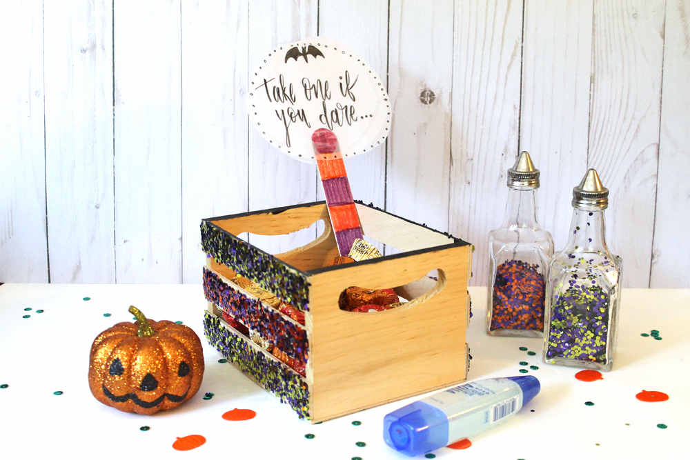 Learn how to create this glittery Trick or Treat Candy Crate in 5 easy steps with @tombowusa and @studiokatie