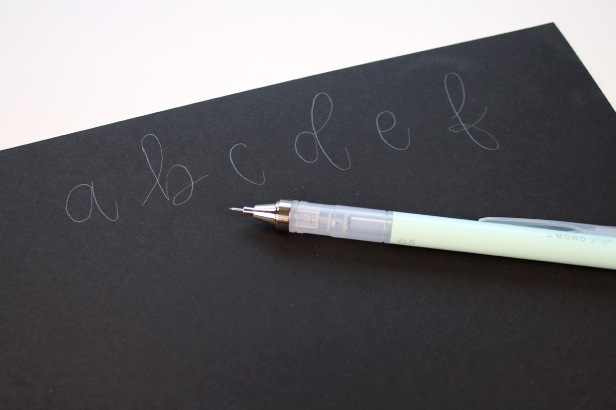 draw the letters with a Tombow MONO Graph Pencil