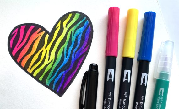 Make a tiger stripe rainbow heart with @tombowusa products in this tutorial by @alilepere. #tigerstripes #rainbow #90skids #tombow